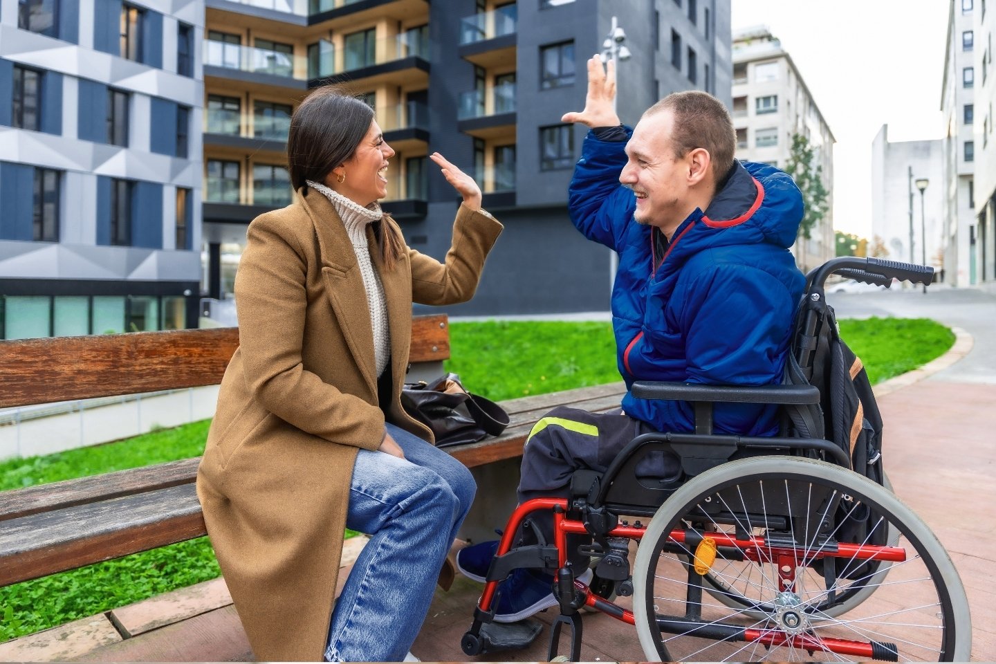 Care provider high five with patient Care provider high five with patient