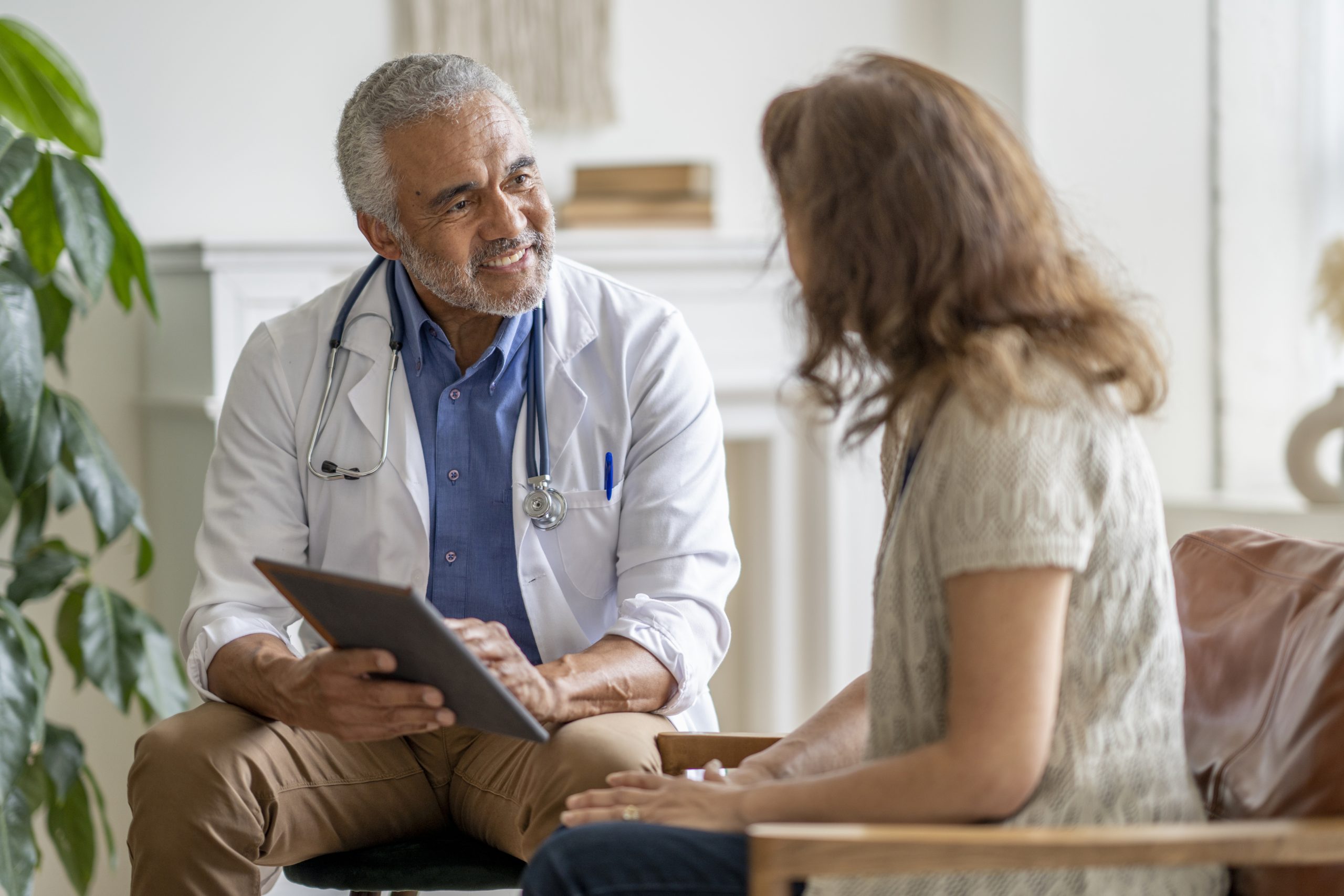 Doctor and Patient Sitting Down and Talking